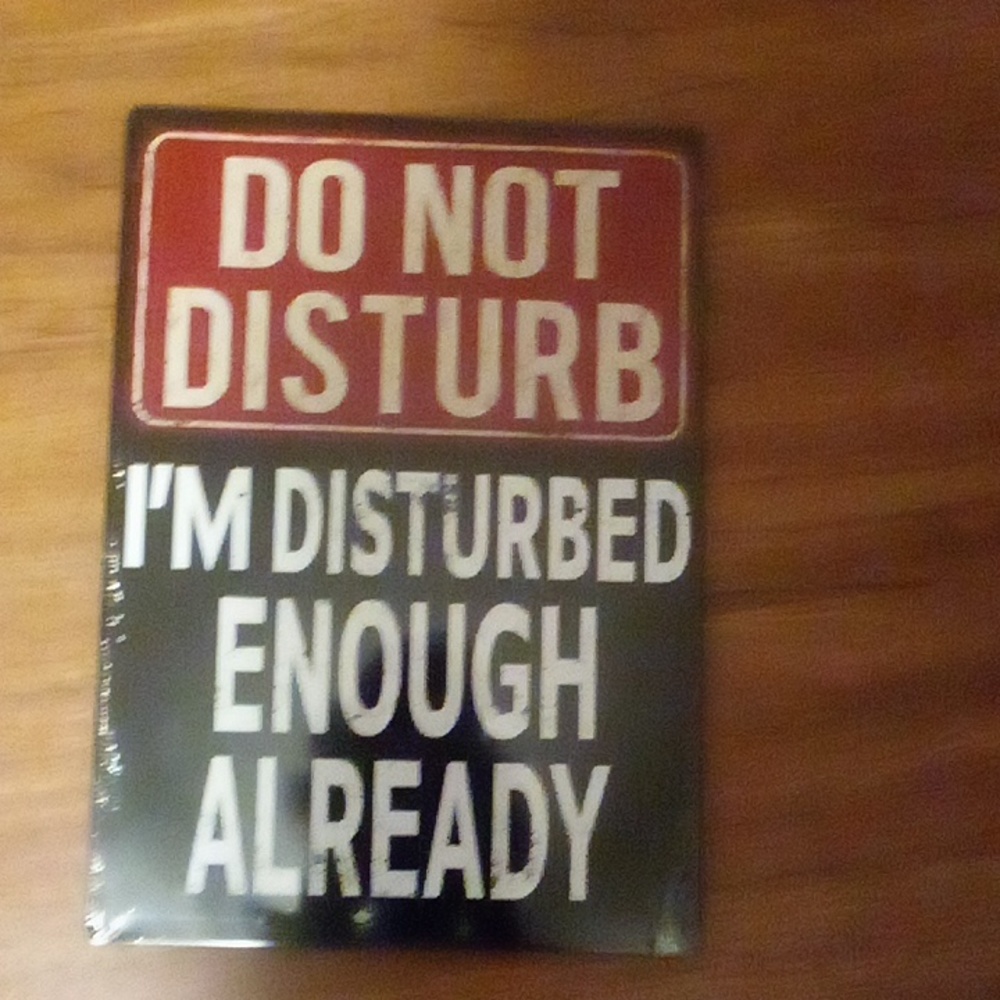 Funny sign! Can hang on wall, doors and more! Marks are supposed to be there!!